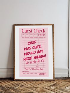 a pink poster with the words guest check written in cursive writing on it