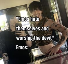 two people standing in front of a mirror with the caption'enos hate themselves and worship the devil emo '