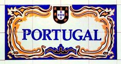 a tile sign that says portugal on the side of a building in an orange and blue pattern