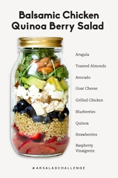 a mason jar filled with salad ingredients and labeled in the words balsamic chicken quinoa berry salad