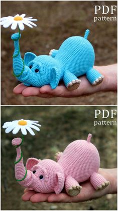 there are two small knitted animals in the palm of someone's hand and one is holding a flower