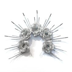 **  This crown is made of plastic zip ties (cable ties).  It is not made of metal.  Please be aware of this before purchasing.  ****  As seen at the 2018 Met Gala!  This the ORIGINAL, AUTHENTIC, and FIRST zip tie halo crown designed by Megan Bishop in 2009.  **The floral rose MARY CROWN is a striking spiked headband crown made of hand painted plastic zip ties of even spacing and alternating size.  This is the rose version of my popular Mary Halo Crown - the original, authentic, first crown that Spiked Crown, Crown Headpiece, Silver Head Piece, Halo Crown, Floral Halo, Winter Fairy, Painting Plastic, Metal Headbands, Cable Tie