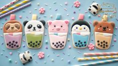 decorated cookies in the shape of animals and pandas