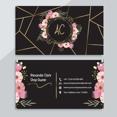 a business card with flowers on it and the letter c in gold foil, black background