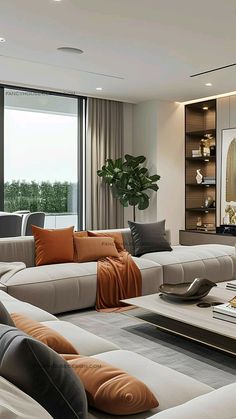 a living room filled with lots of furniture next to a large glass window covered in curtains