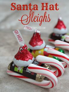 santa hat sleighs made out of candy canes are featured in this christmas ornament craft