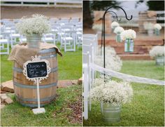 wedding decorations in buckets with chalkboard sign and baby's breath flowers on them