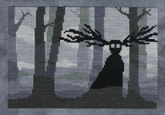 the silhouette of a woman standing in front of trees with antlers on their heads