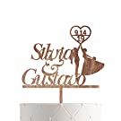 a wedding cake topper that says slayy and casual on it's stand