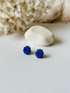 Make your everyday outfit more shiny wearing these blue beaded post earrings. These statement stud earrings are made from Miyuki Delica seed beads and supplied with stainless steel accessories. So lightweight and comfortable to wear, these dainty beaded studs would be the perfect addition to your holiday look. If you're looking for delicate seed bead earrings for winter, this pair is a great finding for you. Also, these minimalist earrings are making a great Christmas gift for bohemian jewelry l Handmade Blue Cluster Earrings For Gift, Beaded Studs, Steel Accessories, Stainless Steel Accessories, Christmas Bead, Dainty Studs, Earrings Christmas, Everyday Outfit, Earrings Statement