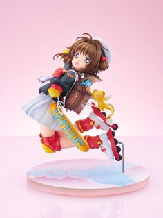 an anime figurine is posed on top of a stand, holding a purse