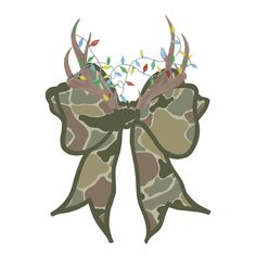 a bow with antlers and lights hanging from it's sides on a white background