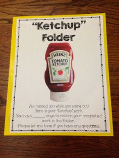 a ketchup holder is shown on a table with a note attached to it