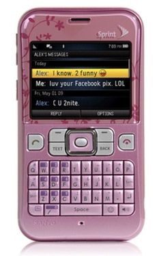 a pink cell phone with flowers on the screen and texting messages to someone else