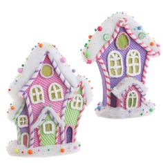 two small houses are decorated with candy canes