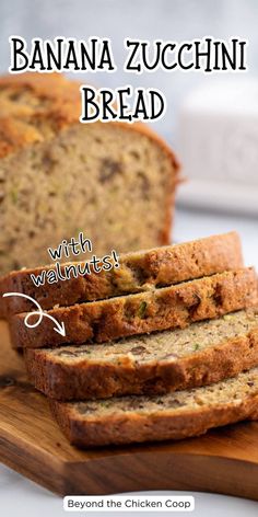 banana zucchini bread with walnuts on a cutting board next to sliced loaf