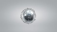 a silver disco ball with words written on it in the middle and an upside down view