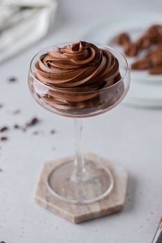 a dessert dish with chocolate frosting in it