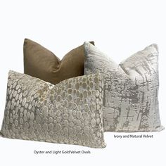 two pillows with different patterns on them, one in grey and the other in beige