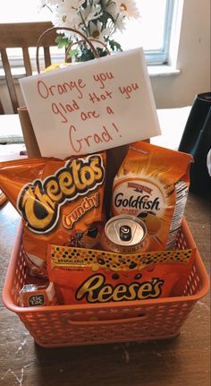 15 Heartwarming Graduation Gifts That Empower the Graduate Grad Gift Basket Ideas For Guys, Diy Graduation Gifts For Boyfriend, Grad Basket Ideas, Bf Graduation Gift, Orange Themed Gift Basket, Orange Gift Basket Ideas, Grad Gifts For Boyfriend