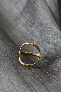 Make a simple statement with our Open Circle Ring. Crafted from stainless steel, this minimalistic ring adds a touch of geometric flair to any outfit. Perfect for those who appreciate understated style. Tarnish Proof Comes in a suede cinched pouch Chic Everyday Metal Rings, Modern Metal Midi Rings, Minimalist Metal Rings With Simple Design, Minimalist Stainless Steel Rings For Everyday, Minimalist Metal Midi Rings, Minimalist Stainless Steel Midi Rings, Modern Metal Midi Rings For Formal Occasions, Modern Stainless Steel Open Midi Rings, Elegant Open Circle Midi Rings