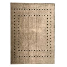 a beige rug with black dots on the top and bottom, against a white background