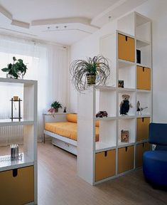 a room with yellow and white furniture in it