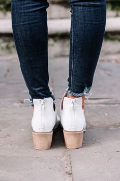 These croc imprinted booties are so cute! The side slits are very fun and we love their short little heel. You are going to find that styling these booties is a piece of cake! True to size. Cute White Low-top Booties, Chic White Block Heel Booties, Comfortable Non-slip White Booties, White Leather Booties Medium Width, White Fitted Western-style Heeled Boots, Mint Julep Boutique, Piece Of Cakes, Levi Jeans, Perfect Fit