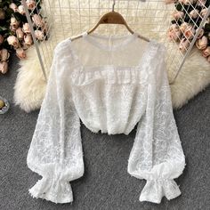 Lovely see-through long-sleeved lace topFabric: tulle, laceColor: white, apricotSize(cm): free size(1inch=2.54cm)length 53cm bust 94cm sleeve length 60cmPlease check the size carefully when you choose items.For more pictures of the jumpsuit, please contact us, thank you. Fall Lace Top With Sheer Long Sleeves, Long Sleeve Crochet Lace Top, White Sheer Long Sleeve Mesh Top, White Sheer Long Sleeve Lace Top, White Long Sleeve Tops With Lace Sleeves, White Long Sleeve Feminine Lace Top, White Long Sleeve Lace Patchwork Top, White Long Sleeve Lace Top With Patchwork, White Long Sleeve Lace Top For Party