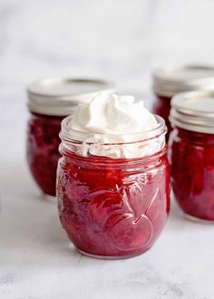 three jars with whipped cream in them and the words dr pepper's gingered salad