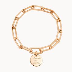 Forever linked by love. Featuring an iconic hinge to clip on your hand-engraved charms, this personalized link bracelet can be hand-engraved with your special words or messages.Available in 18K Champagne Gold PlatedCharm: 0.6 Diameter, 0.03 ThicknessChain length &amp; style: 7.3 Thick Trace ChainCharms are removable from this chain and can be worn with other Merci Maman charmsHand-engraved in our Paris workshopSent with love in a complimentary gift boxAny slight variations in lettering depth Engraved Classic Charm Bracelet, Engraved Charm Bracelet For Personalized Gift, Everyday Engraved Chain Bracelet, Engraved Chain Bracelet For Everyday Wear, Gift Rose Gold Oval Link Chain Bracelet, Personalized Engraved Charm Bracelet, Personalized 14k Gold Chain Bracelet, Engraved White Gold Charm Bracelet, Charm Bracelet With Solid Links As A Gift