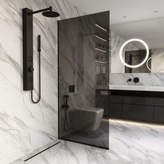 a modern bathroom with marble walls and flooring