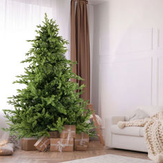 a living room with a christmas tree and presents