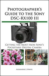 a book cover with pictures of flowers and people in the background, including a camera