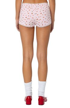 A dainty strawberry print decorates these stretchy cotton shorts designed in a leggy length with scalloped lace trim and a low-rise waist. Pull-on style 95% cotton, 5% spandex Machine wash, dry flat Imported Cute Fitted Shorts With Elastic Waistband, Cute Fitted Cotton Bottoms, Cute Fitted Short Bottoms, Cute Fitted Short Length Shorts, Cute Stretch Cotton Bottoms, Cute Fitted Shorts, Casual Pink Bottoms With Strawberry Print, Cute Stretch Bottoms Of Short Length, Fitted Cotton Pajama Shorts With Short Inseam