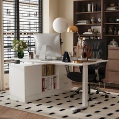 a desk with a computer on top of it in front of a bookshelf