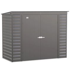 a large metal storage shed with two doors