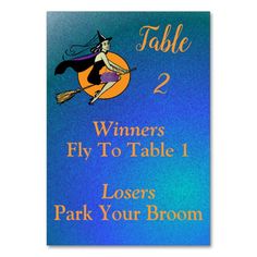 a sign that says, table 1 winners park your broom loses fly to table 3