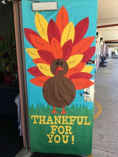 a sign that says, thank you with a turkey on it