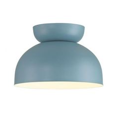 a blue light fixture on a white wall