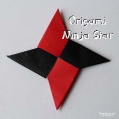 an origami ninja star made out of red and black paper