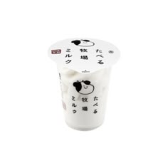 a cup with some writing on it and an animal in the bottom half of it