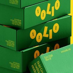 three green boxes stacked on top of each other with numbers printed on the front and back