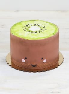 a cake decorated with an image of a kiwi