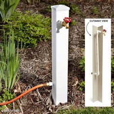 an image of a white door handle on the side of a house with flowers and plants around it