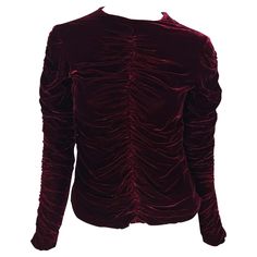 Presenting a gorgeous ruched deep red velvet Gucci top, designed by Tom Ford. From the Fall/Winter 1999 collection, this fabulous top debuted on the season's runway. Completely covered in ruching, this top features long sleeves and a crew neckline. Made complete with tactful seams, this beautiful top is the perfect addition to any wardrobe! Approximate measurements: Size - IT38 24" shoulder to hem 35" bust 29.5" waist 22.5" shoulder to cuff 20" underarm to cuff 74% viscose, 26% silk Tom Ford Runway, Velvet Gucci, Deep Red Velvet, Gucci By Tom Ford, Carolyn Murphy, Gucci Top, White Blouse Top, Hermes Kelly Bag, Velvet Blouse