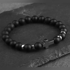 Brand New Matte Black Natural Stone Cross Bracelet Hematite Stainless Steel Cross Elastic Rope Map Lava Bead Bracelet For Men Or Women Charm Jewelry Minimalist Black Wristband With Round Beads, Casual Black Beaded Wristband, Elegant Black Hematite Crystal Bracelet, Black Cross Bracelet, Masculine Black Bracelets For Everyday, Black Hematite Crystal Bracelet Spiritual, Masculine Black Bracelet Jewelry, Bead Bracelet For Men, Stone Cross