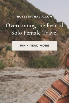 a woman wrapped in a blanket with the words, overcoming the fear of solo female travel pin + read more