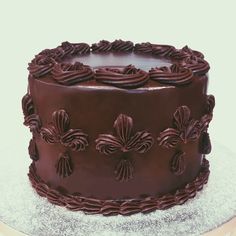 a chocolate cake sitting on top of a table