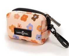 a small pink flowered pouch with black zipper